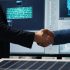 factory-manager-shakes-hands-with-investor-working-expand-production